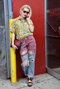 NEW YORK, NY - SEPTEMBER 08:  Ryann Foulke is seen outside the Jeremy Laing show wearing a vintage top, Comme Des Garcons trousers, vintage shoes, Celine bag and Valentino sunglasses on September 8, 2013 in New York City.  (Photo by Daniel Zuchnik/Getty Images)